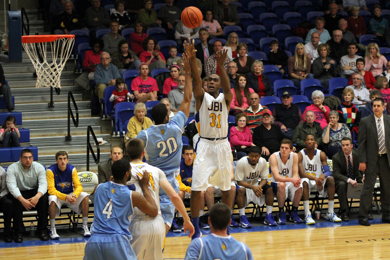 Taylor's 16 Points, Anderson's Seven Blocks Power John Brown over Wayland Baptist, 67-60