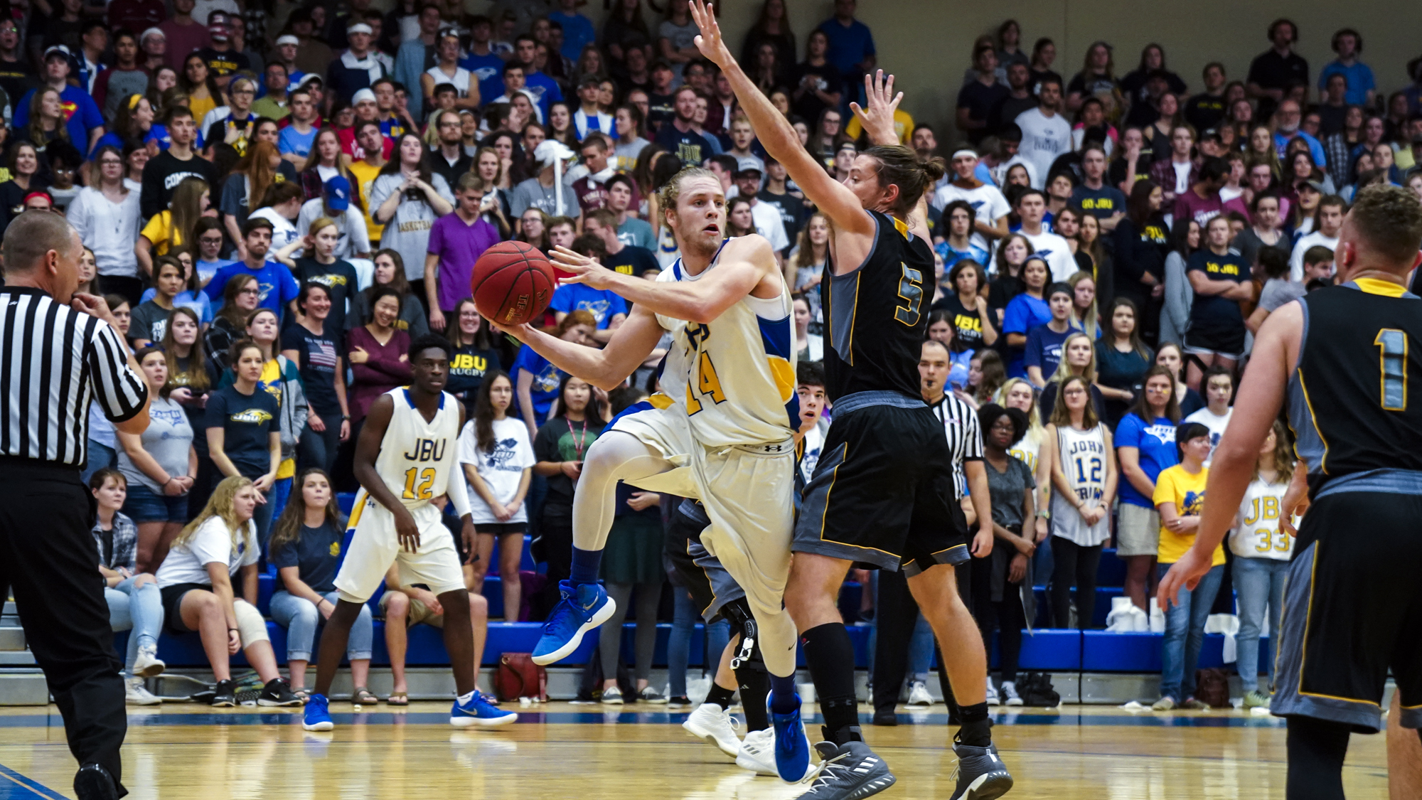 Toilet paper unleashed; men’s basketball rides strong first half past Ecclesia