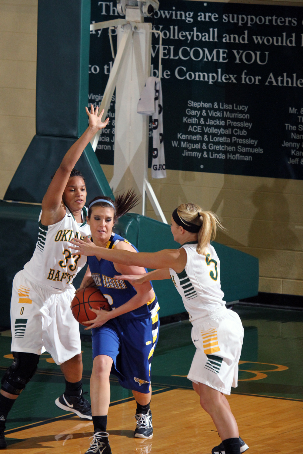 Parish, Rogers Find Double Figures, Golden Eagles Fall 56-46